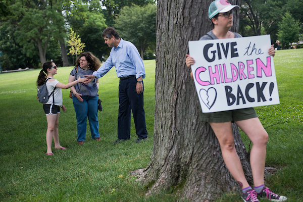 Dr. William Kennedy Smith greets attendees of a rally on the East Front lawn of the Capitol to condemn the separation and detention of families at the border of the U.S. and Mexico on June 21, 2018. (Photo By Tom Williams/CQ Roll Call)