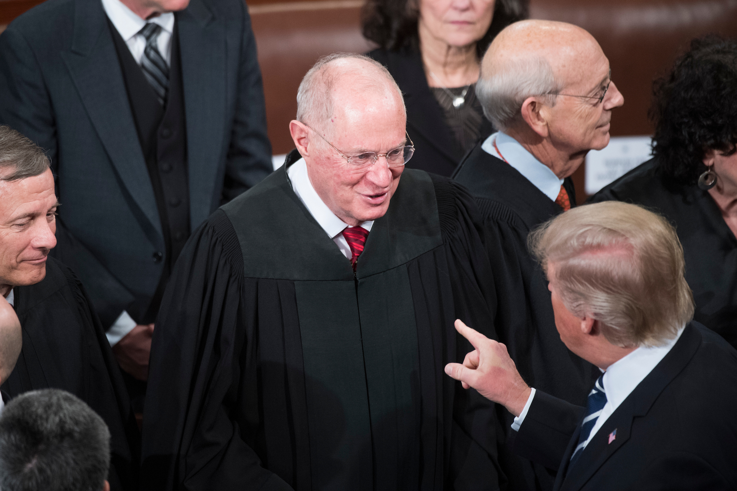 President Donald Trump greets Supreme Court Justice Anthony Kennedy after addressing a joint session of Congress in the Capitol’s House Chamber, Feb. 28, 2017. (Tom Williams/CQ Roll Call file photo)