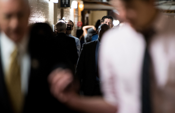 UNITED STATES - JUNE 20: Speaker of the House Paul Ryan, R-Wisc., leaves the House Republican Conference meeting in the basement of the Capitol on Wednesday, June 20, 2018. (Photo By Bill Clark/CQ Roll Call)