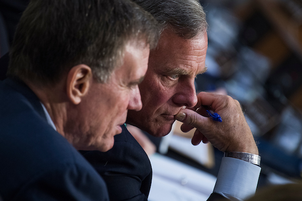 UNITED STATES - JUNE 20: Chairman Richard Burr, R-N.C., right, and Vice Chairman Mark Warner, D-Va., conduct a Senate (Select) Intelligence Committee hearing in Hart Building titled 