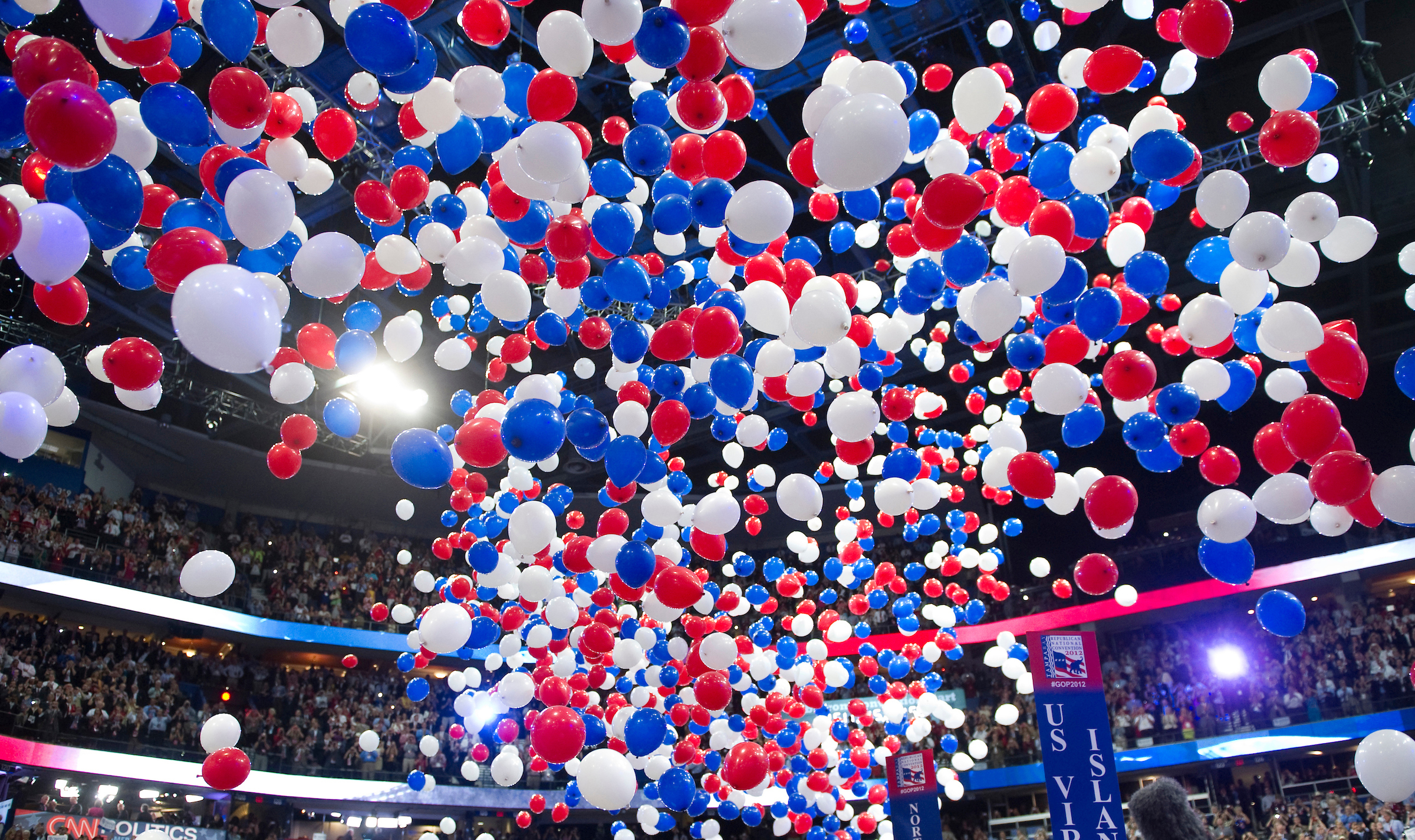 People want to vote “for” someone or something, but what they get from the two major parties has more to do with why the other side is so bad, Winston writes. Above, balloons drop at the 2012 Republican National Convention in Tampa, Fla. (Chris Maddaloni/CQ Roll Call file photo)