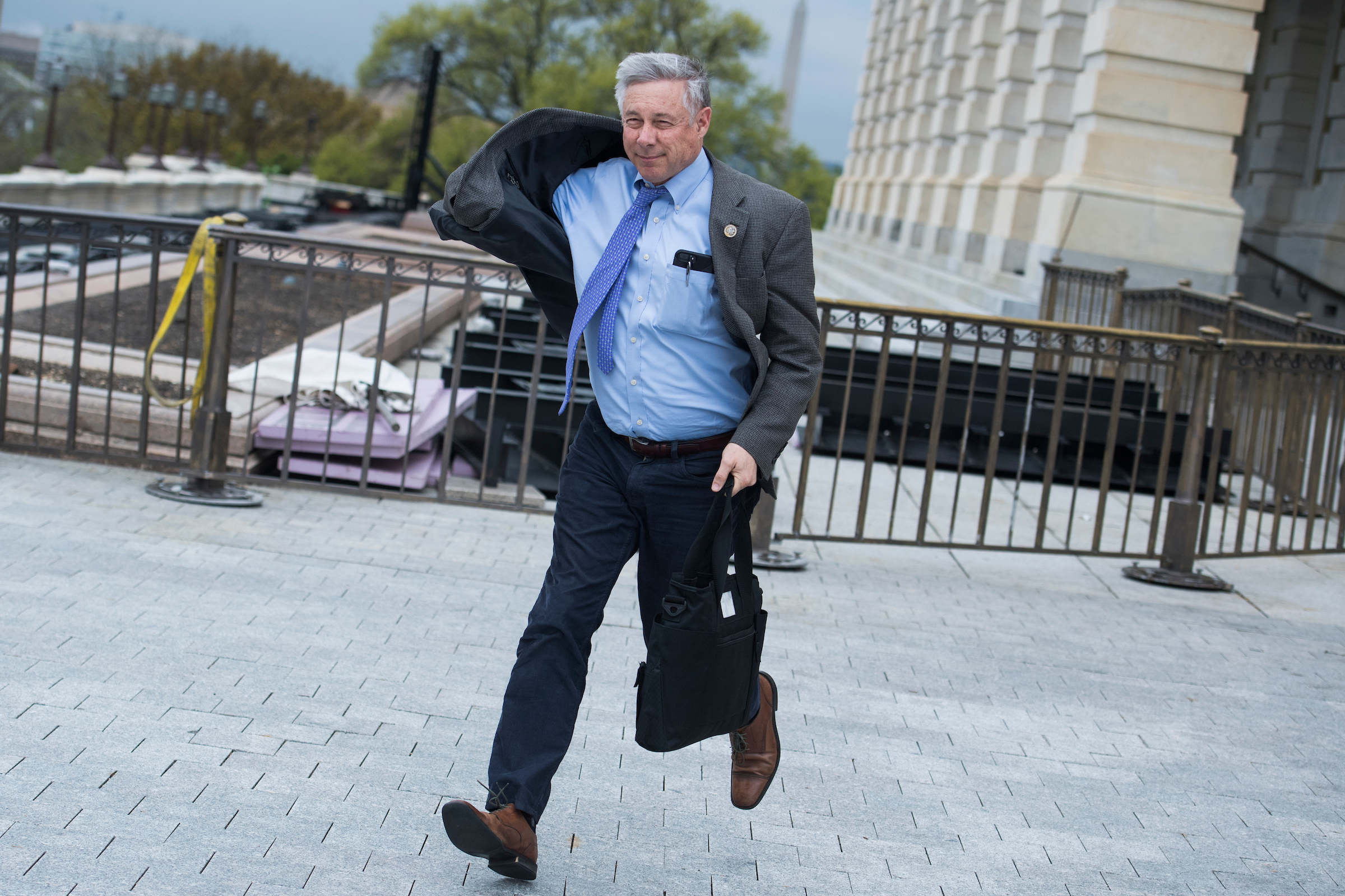 Rep. Fred Upton, R-Mich., pictured here, says his vote against a carbon tax is not inconsistent with his membership in the Climate Solutions Caucus. (Tom Williams/CQ Roll Call)