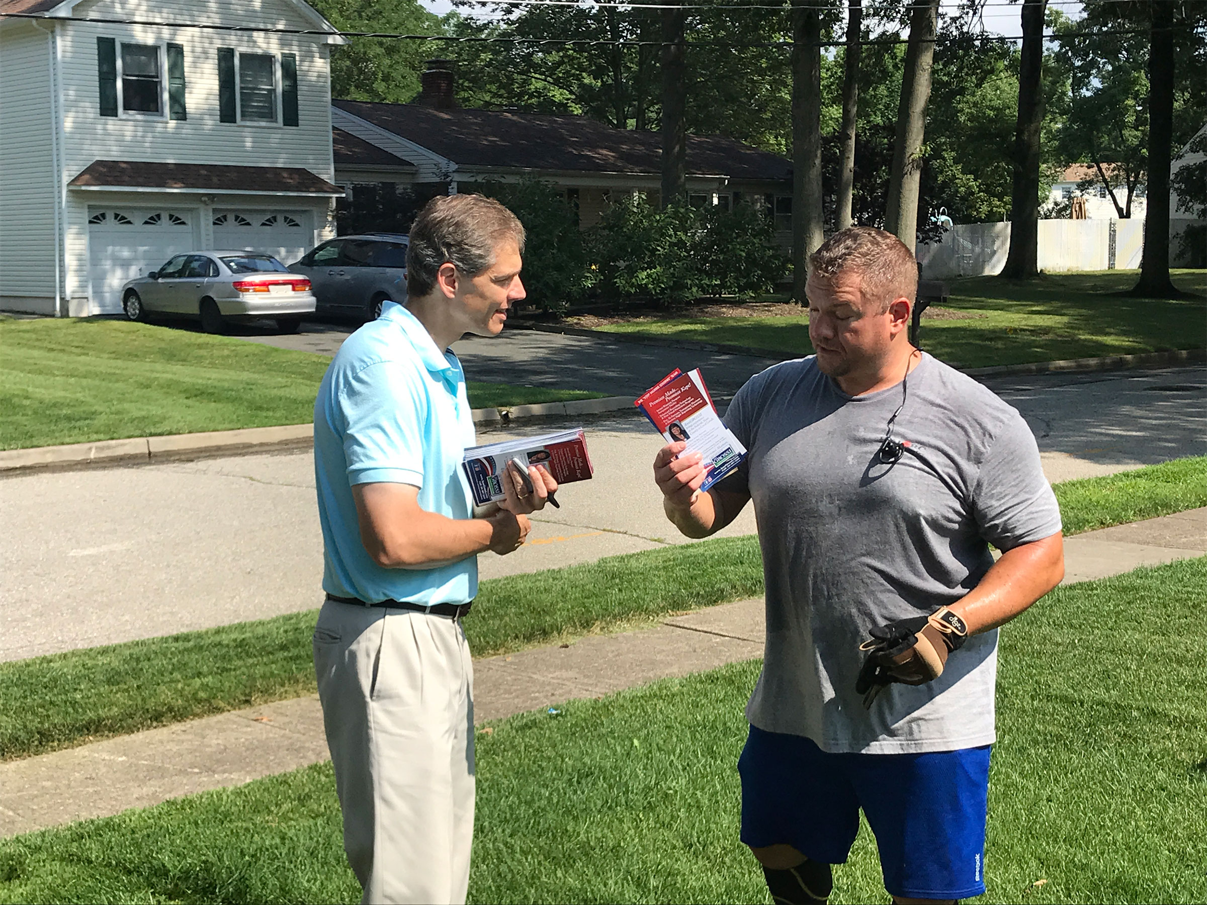 Republican state Assemblyman Jay Webber, left, who faces Sherrill in the fall, canvasses Saturday in Parsippany, N.J. (Simone Pathé/CQ Roll Call)