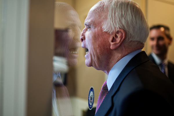 UNITED STATES - JANUARY 13: Sen. John McCain, R-Ariz., fools around with colleagues upon arriving for a news conference in the Senate studio on Guantanamo detainees, January 13, 2015. (Photo By Tom Williams/CQ Roll Call)