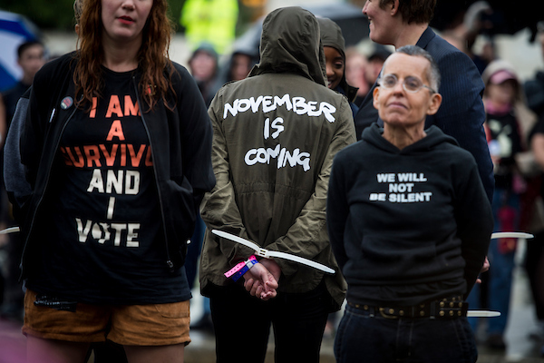 A group of women are arrested after sitting-in on First Street outside of the Supreme Court as  nominee Brett Kavanaugh testifies before the Senate Judiciary Committee on Thursday. (Sarah Silbiger/CQ Roll Call)