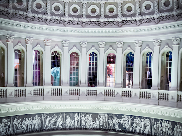 UNITED STATES - SEPT 10: A little girl and a man look through the windows of the Capitol dome miniature model in the Capitol Visitors Center Monday afternoon Sept. 10, 2018. (Photo By Sarah Silbiger/CQ Roll Call)