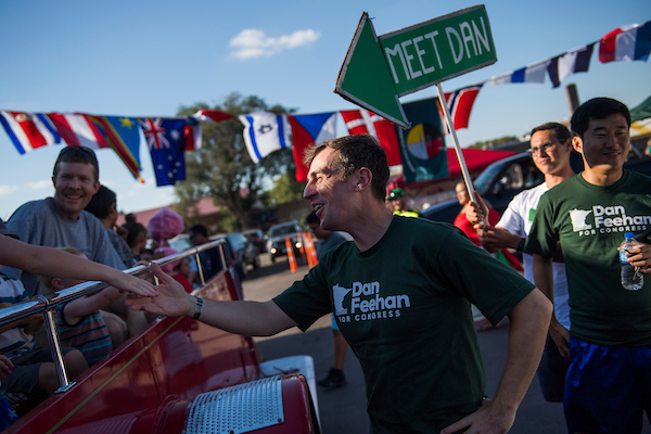 Dan Feehan, the Democratic nominee in Minnesota’s 1st District, greets guests at the Multicultural Fiesta in St. James, Minn., on Saturday. (Tom Williams/CQ Roll Call)