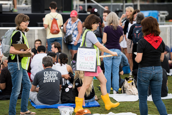 UNITED STATES - SEPTEMBER 29: Campaign volunteers work the crowd to register supporters to vote before the start of Rep. Beto O'Rourke's Turn out For Texas Rally, featuring a concert by Wille Nelson, in Austin, Texas on Saturday, Sept. 29, 2018. (Photo By Bill Clark/CQ Roll Call)
