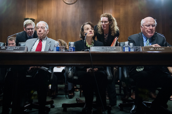 Judiciary Chairman Charles Grassley, R-Iowa, ranking member Sen. Dianne Feinstein, D-Calif., and Sen. Patrick J. Leahy, D-Vt., conduct a markup of the Senate Judiciary Committee on September 13, 2018, where Republicans voted to move the committee vote on Supreme Court nominee Brett Kavanaugh to September 20th. (Tom Williams/CQ Roll Call)