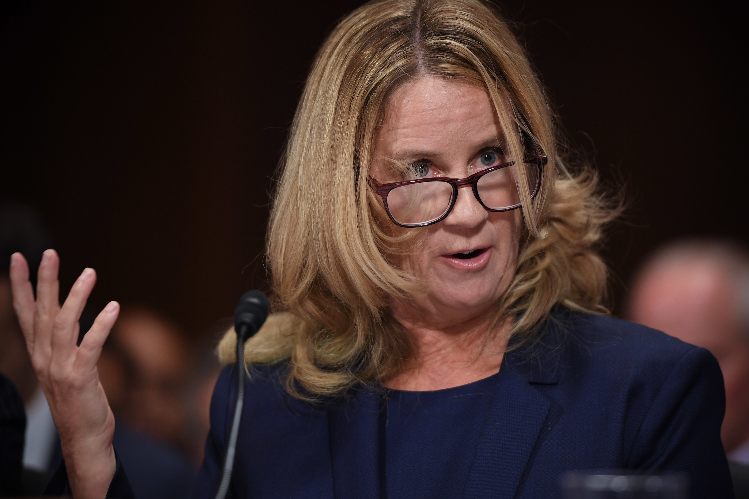 Christine Blasey Ford, the woman accusing Supreme Court nominee Brett Kavanaugh of sexually assaulting her at a party 36 years ago, testifies before the Senate Judiciary Committee on Thursday. (POOL PHOTO / SAUL LOEB / AFP)