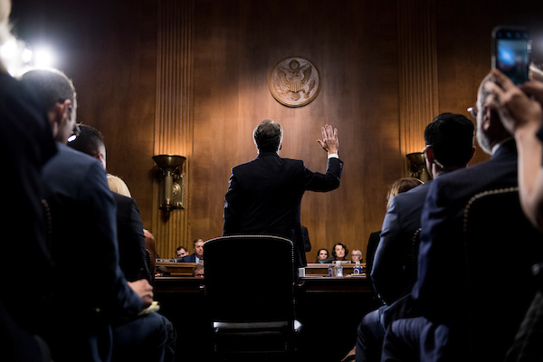 Kavanaugh is sworn in Thursday afternoon. (Tom Williams/CQ Roll Call)