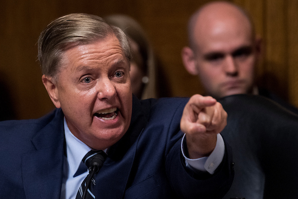 UNITED STATES - SEPTEMBER 27: Sen. Lindsey Graham, R-S.C., points at the Democrats as he defends Judge Brett Kavanaugh during the Senate Judiciary Committee hearing on his nomination be an associate justice of the Supreme Court of the United States, focusing on allegations of sexual assault by Kavanaugh against Christine Blasey Ford in the early 1980s. (Photo By Tom Williams/CQ Roll Call/POOL)