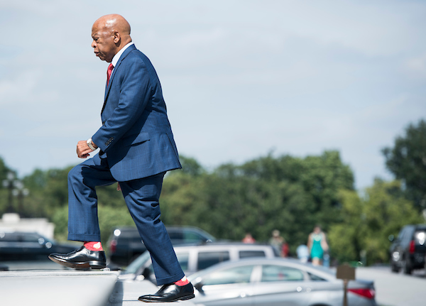 UNITED STATES - SEPTEMBER 26: Rep. John Lewis, D-Ga., walks up the House steps for a vote in the Capitol on Wednesday, Sept. 26, 2018. (Photo By Bill Clark/CQ Roll Call)