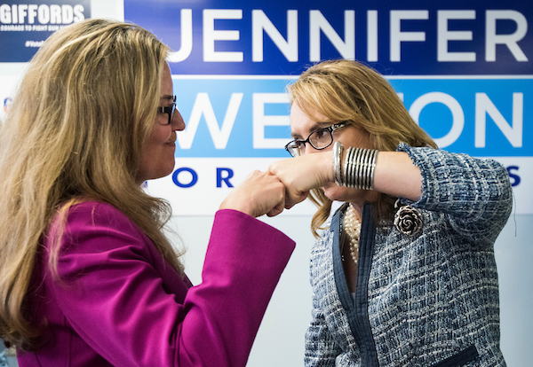 Former Rep. Gabrielle Giffords' PAC is investing $1 million in Virginia’s 10th District against GOP Rep. Barbara Comstock. Giffords is shown here with Jennifer Wexton, Comstock's Democratic challenger. (Bill Clark/CQ Roll Call)