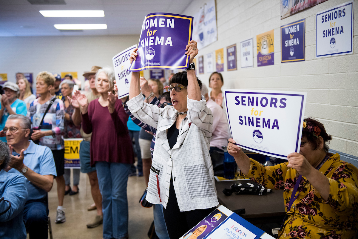 Supporters cheer as Democratic candidate for U.S. Senate Rep. Kyrsten Sinema, D-Ariz., arrives to at a union hall in Tucson. (Bill Clark/CQ Roll Call)