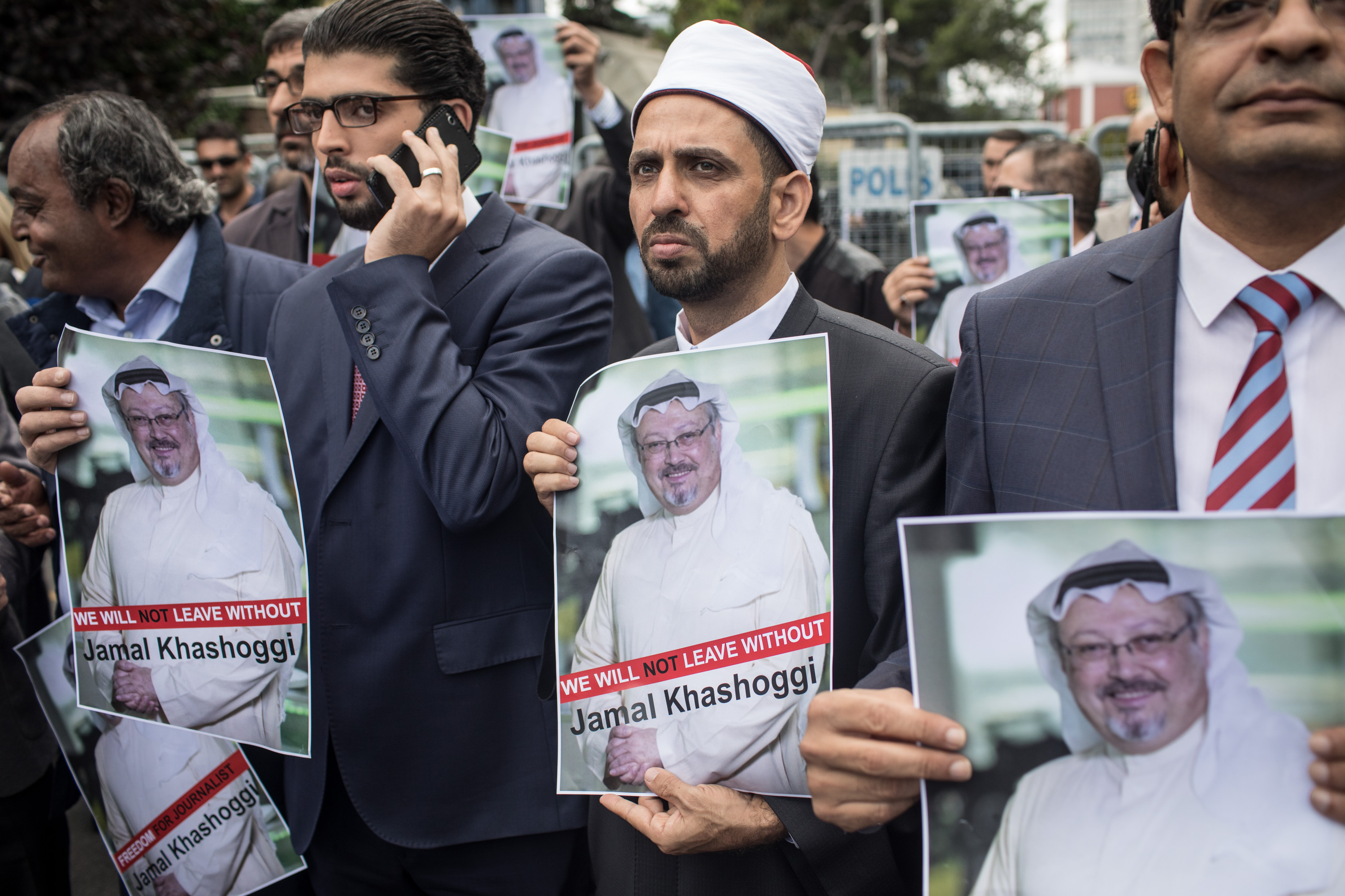 People hold posters of Saudi journalist Jamal Khashoggi during a protest organized by members of the Turkish-Arabic Media Association at the entrance to Saudi Arabia’s consulate on October 8, 2018, in Istanbul, Turkey. (Chris McGrath/Getty Images)