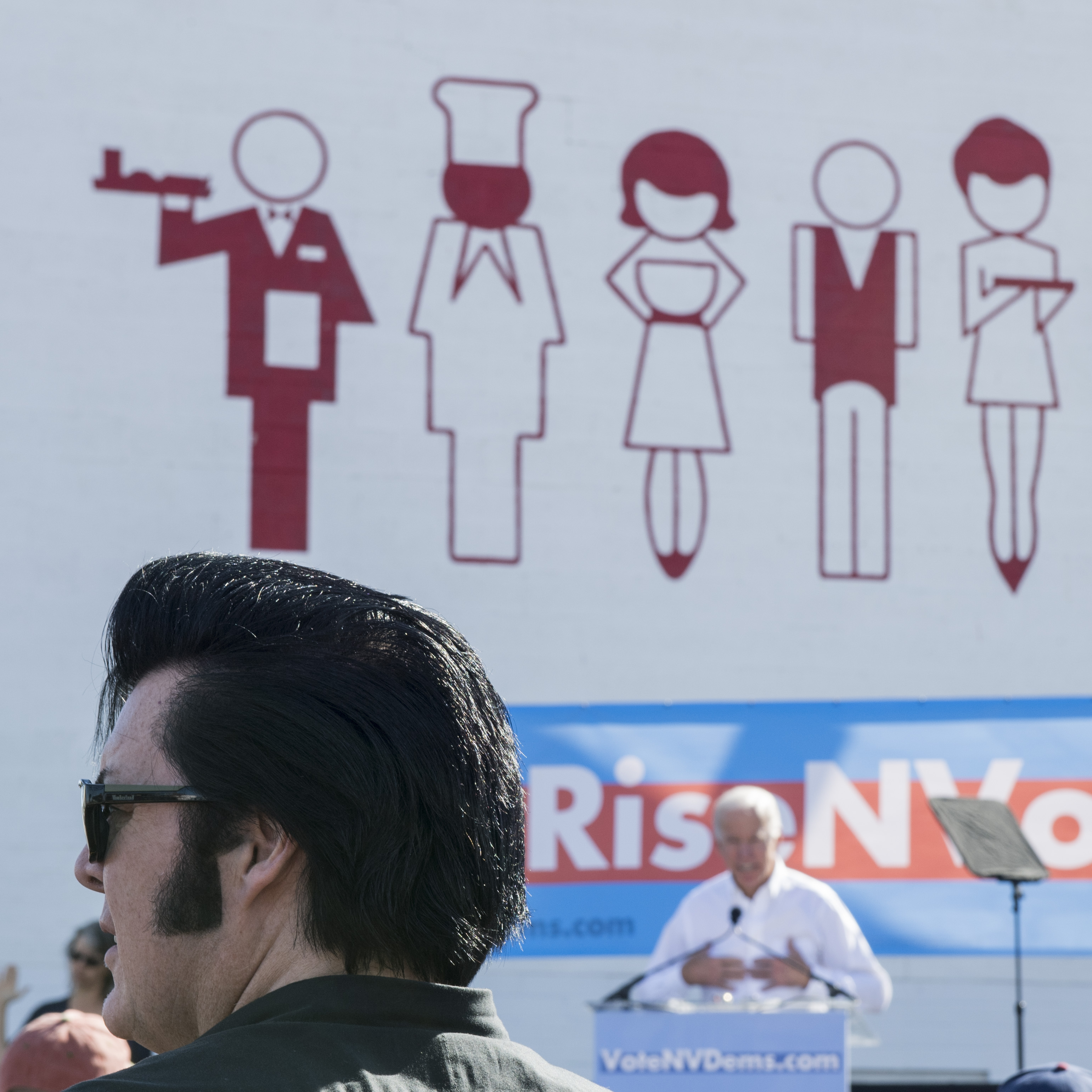 UNITED STATES - OCTOBER 20: An Elvis impersonator looks on as former Vice President Joe Biden speaks at the Nevada Democrats' early vote rally at the Culinary Workers Union Local 226 in Las Vegas on Saturday, Oct. 20, 2018, the first day of early voting in Nevada. (Photo By Bill Clark/CQ Roll Call)