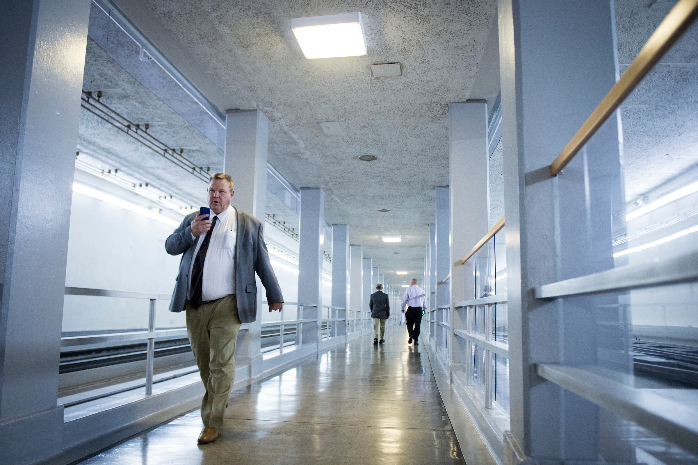 Sen. Jon Tester, D-Mont., walks to the Senate Democrats' policy lunch in the Capitol via the Senate subway tunnel Tuesday, Sept. 25, 2018. (Sarah Silbiger/CQ Roll Call file photo)