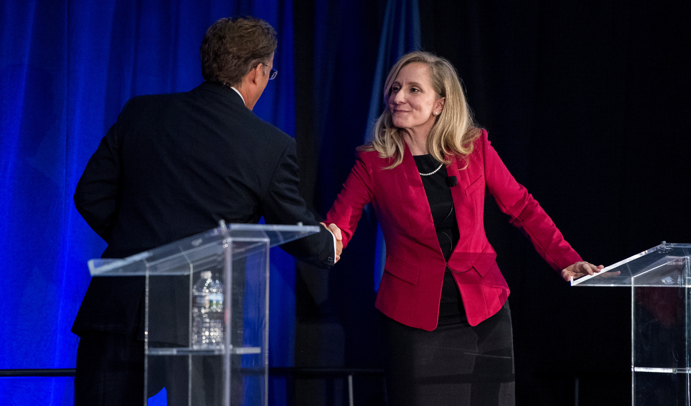 Rep. Dave Brat, R-Va., and Abigail Spanberger, his Democratic challenger in Virginia’s 7th District, shake hands Monday after a debate at the Germanna Community College in Culpeper, Va. (Bill Clark/CQ Roll Call)