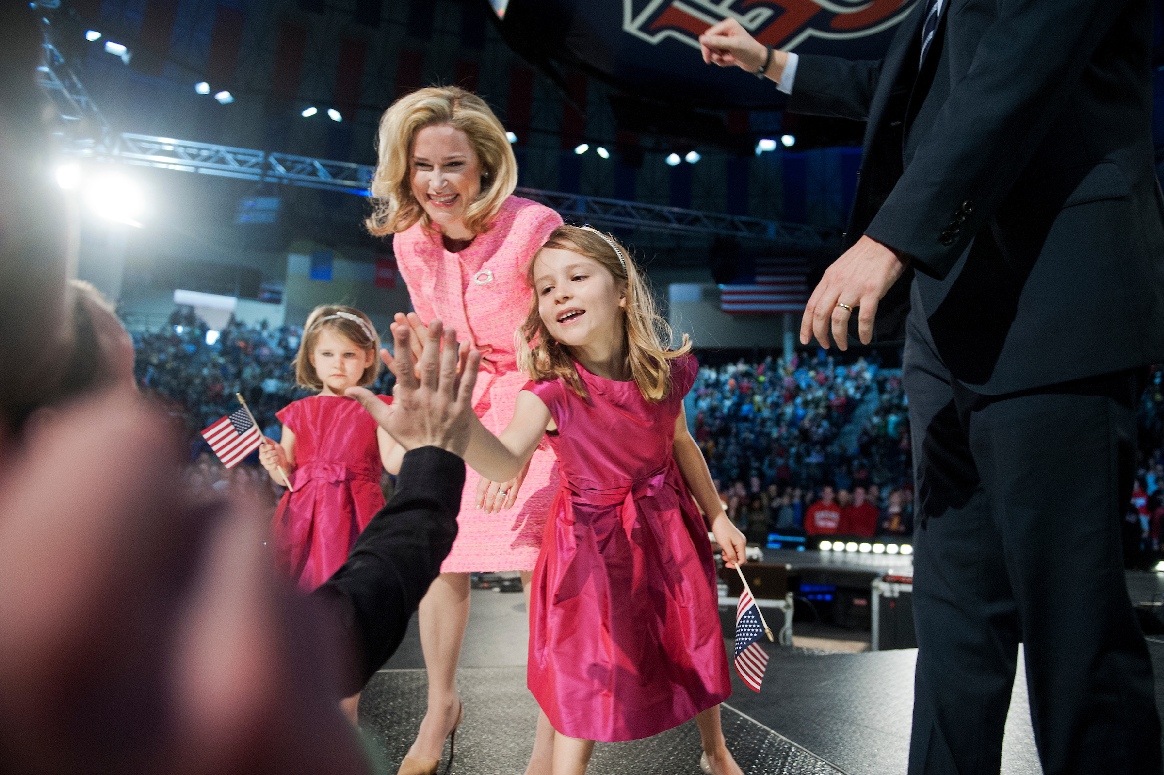 Heidi Cruz and and daughters Caroline, right, and Catherine greet guests during a convocation in March 2015 at Liberty University in Lynchburg, Va., where Sen. Ted Cruz announced his candidacy for president. (Tom Williams/CQ Roll Call file photo)