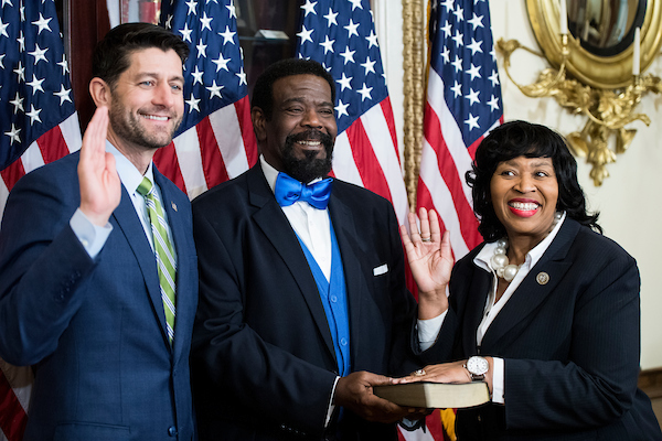 UNITED STATES - NOVEMBER 29: Speaker of the House Paul Ryan, R-Wisc.,left, poses with Rep. Brenda Jones, D-Mich., during her ceremonial swear-in in the Capitol on Thursday, Nov. 29, 2018. (Photo By Bill Clark/CQ Roll Call)