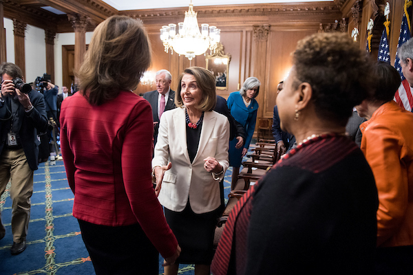 UNITED STATES - NOVEMBER 30: From left, Rep. Cheri Bustos, D-Ill., House Minority Leader Nancy Pelosi, D-Calif., and Rep. Barbara Lee, D-Calif., talk after the incoming House Democratic leadership team posed for a group photo in the Rayburn Room in the U.S. Capitol on Friday, Nov. 30, 2018. (Photo By Bill Clark/CQ Roll Call)