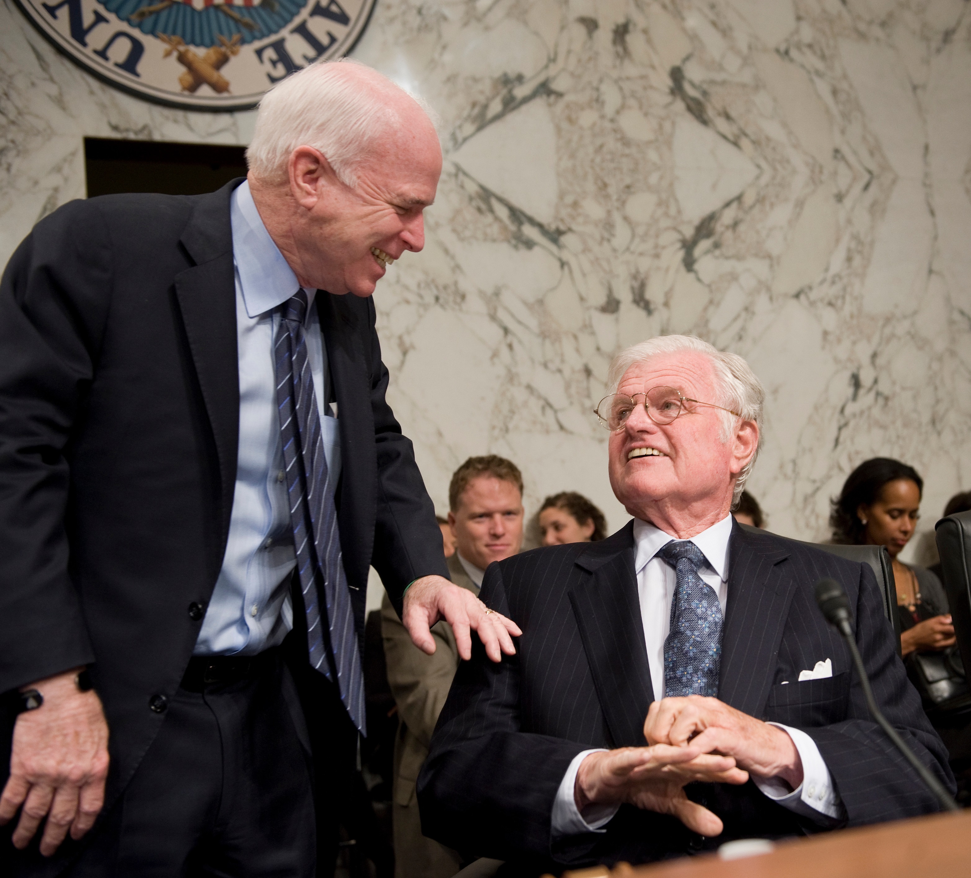 The late Sen. Ted Kennedy, D-Mass., right, is the inspiration behind the Bipartisan Dinner Group for staffers. (CQ Roll Call file photo)