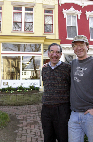 5riverby022801 -- Father and son co-owners Steve, left, and Paul Cymrot in front of Riverby Books on East Capitol Street.