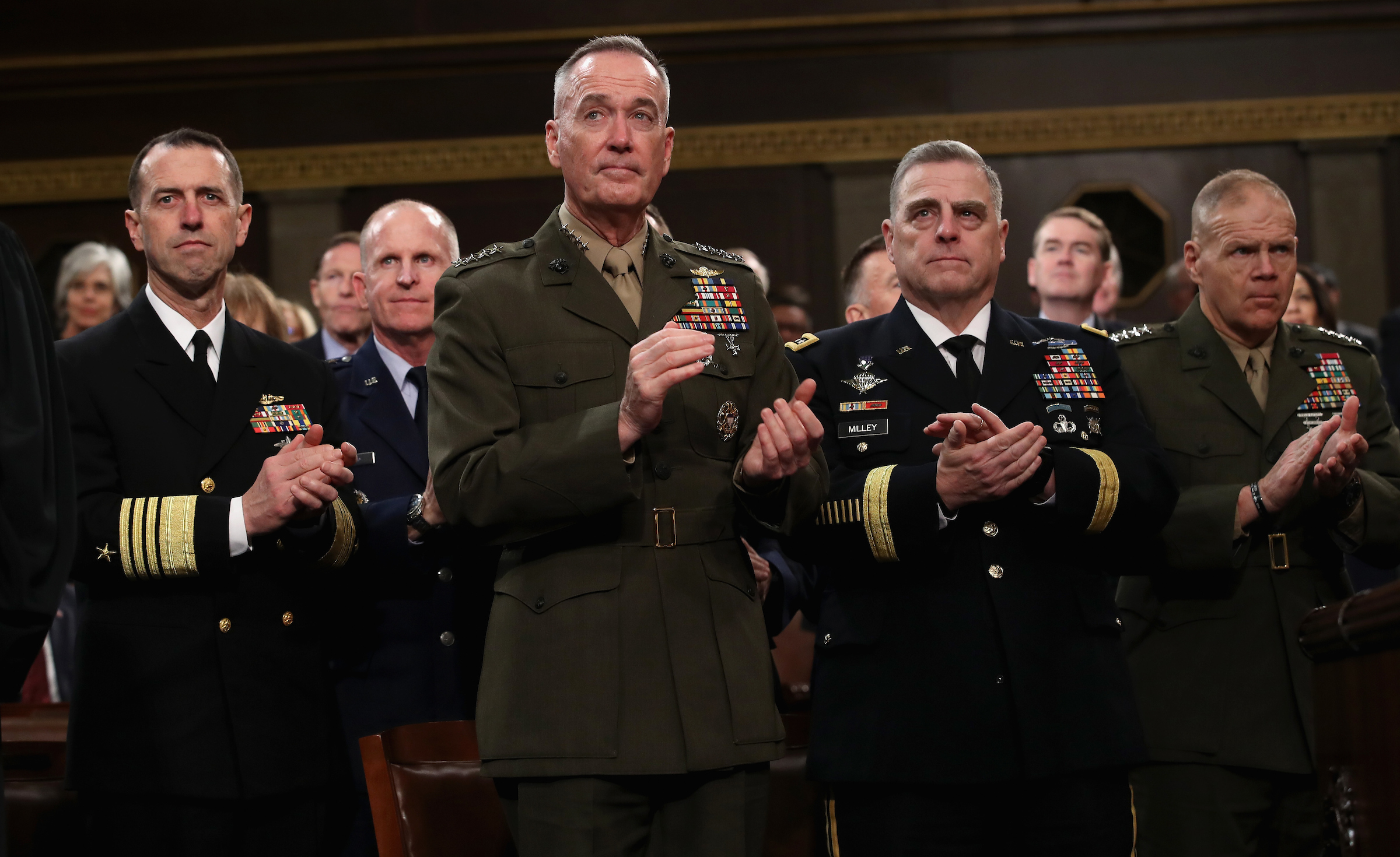 Army Chief of Staff Gen. Mark Milley, second from right, applauds President Donald Trump’s State of the Union address in January with, from left, Chief of Naval Operations Adm. John Richardson, Chairman of the Joint Chiefs of Staff Gen. Joseph Dunford, and Commandant of the Marine Corps Gen. Robert Neller. (Win McNamee/Getty Images file photo)