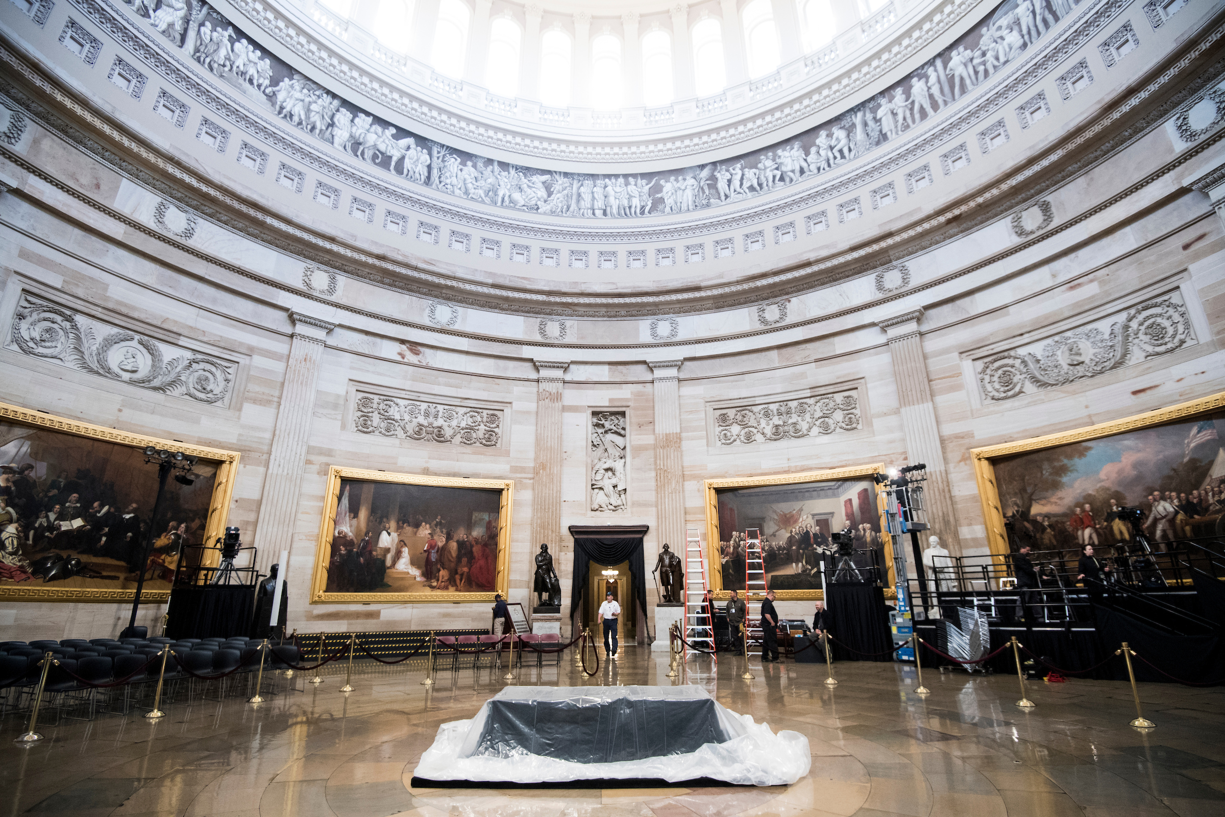 Workers set up the Capitol Rotunda on Monday for the body of former President George H.W. Bush to lie in state. The House and Senate have both altered legislative schedules to honor Bush, who died Friday at age 94.(Bill Clark/CQ Roll Call)