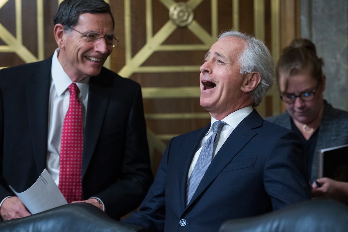 UNITED STATES - APRIL 23: Chairman Bob Corker, R-Tenn., right, and Sen. John Barrasso, R-Wyo., confer before a Senate Foreign Relations committee markup in Dirksen Building on the nomination of Mike Pompeo to be secretary of state on April 23, 2018. (Photo By Tom Williams/CQ Roll Call)