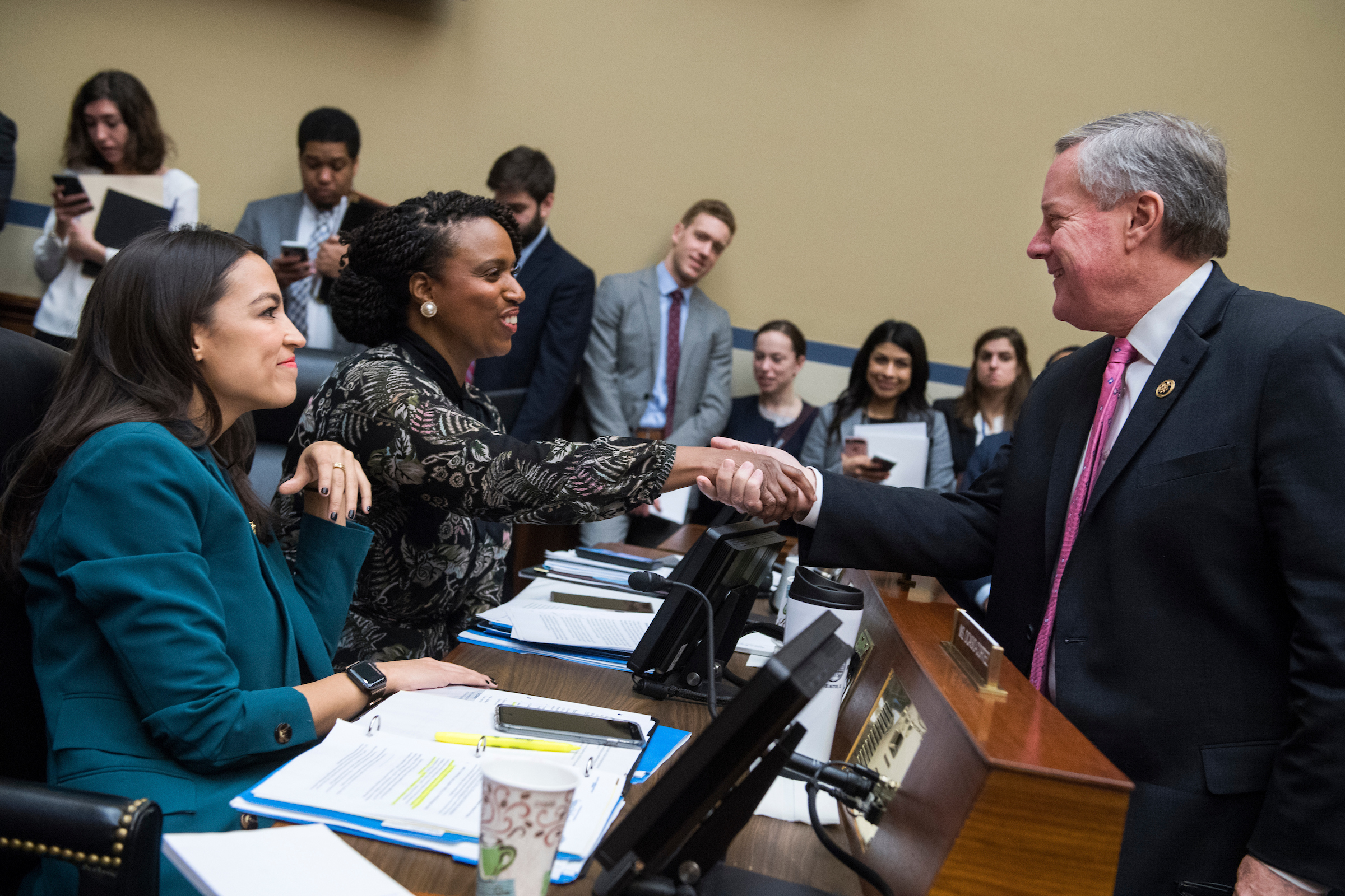 From left, Reps. Alexandria Ocasio-Cortez, D-N.Y., Ayanna Pressley, D-Mass., and Mark Meadows, R-N.C., talk during a House Oversight and Reform Committee business meeting in Rayburn Building on Tuesday, Jan. 29, 2019. (Tom Williams/CQ Roll Call)