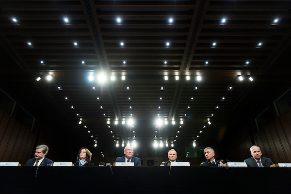 From left, FBI Director Christopher Wray, CIA Director Gina Haspel, DNI Director Dan Coats, DIA Director Robert Ashley, NSA Director Paul Nakasone, and National Geospatial-Intelligence Director Robert Cardillo testify during the Senate Intelligence Committee hearing on “Worldwide Threats” on Tuesday. (Bill Clark/CQ Roll Call)