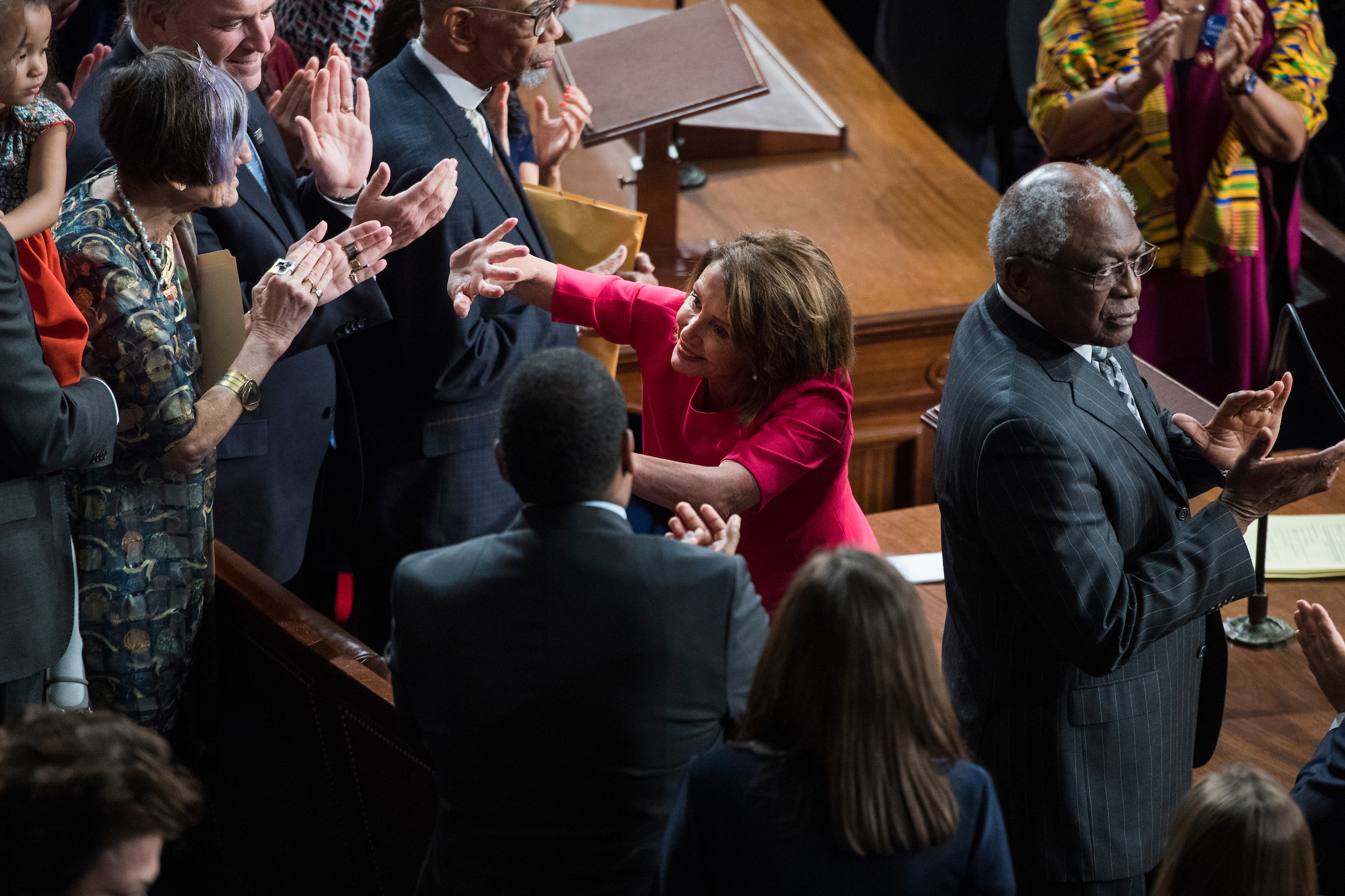 Speaker Nancy Pelosi, D-Calif., is congratulated in the Capitol’s House chamber Thursday after winning the speakership on the first day of the 116th Congress. (Tom Williams/CQ Roll Call)