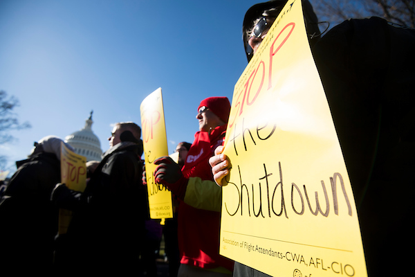 Members of the Association of Flight Attendants participate in the National Air Traffic Controllers Association rally to “Stop the Shutdown” in front of the Capitol on Thursday, Jan. 10, 2019. (Bill Clark/CQ Roll Call)