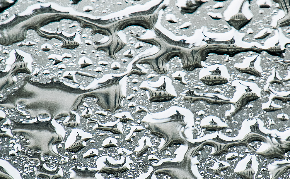 The dome of the U.S. Capitol is seen through rain drops on the skylight of the Capitol Visitor Center on Thursday, May 17, 2018. (Bill Clark/CQ Roll Call)