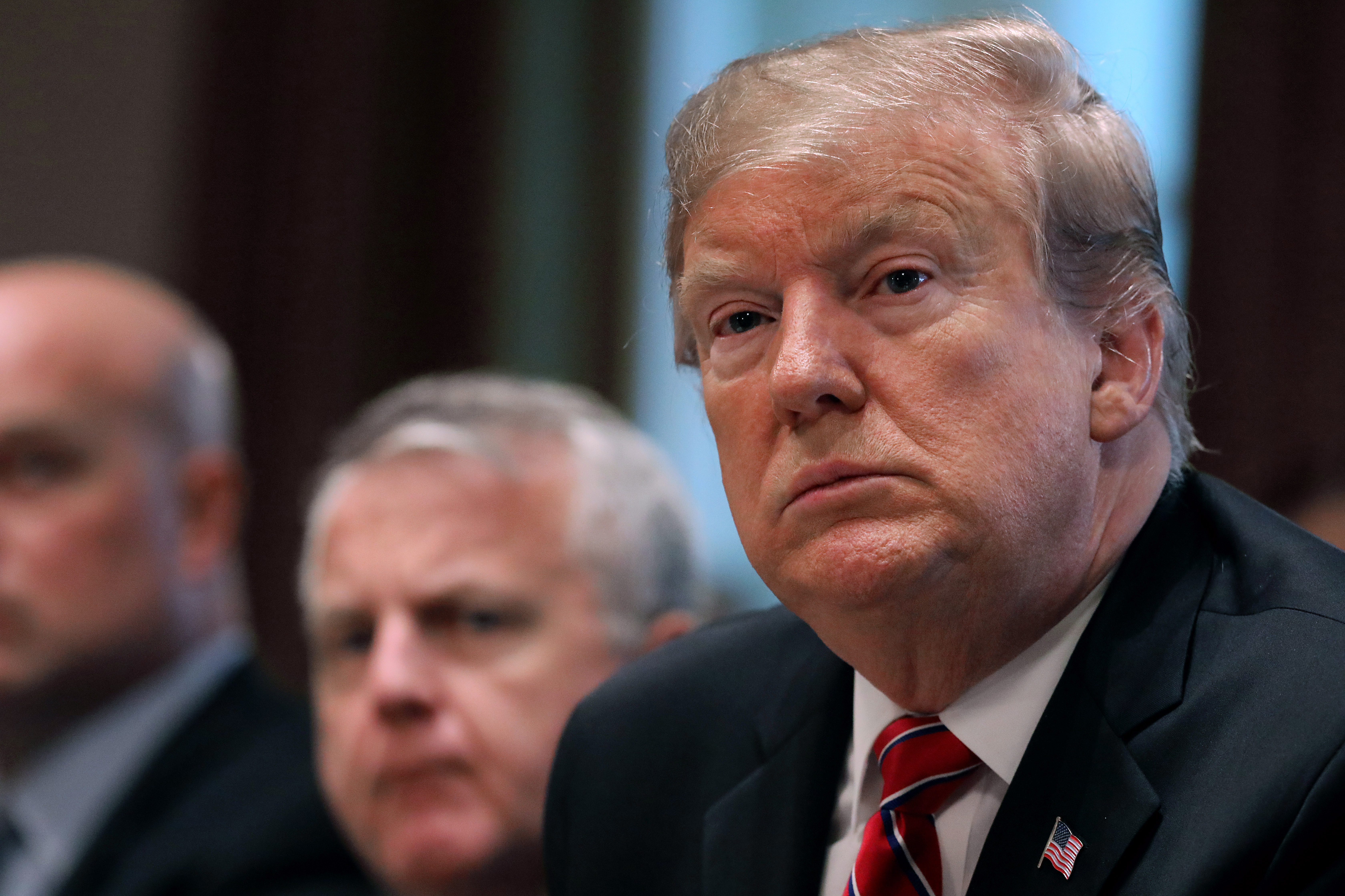 President Donald Trump talks to reporters during a meeting of his cabinet on Tuesday. (Chip Somodevilla/Getty Images)