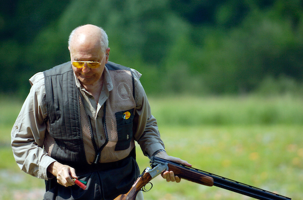 John Dingell get set up on the skeet range during the 10th Annual Great Congressional Shoot-Out at Prince George's Shooting Center in Glenn Dale, Maryland.