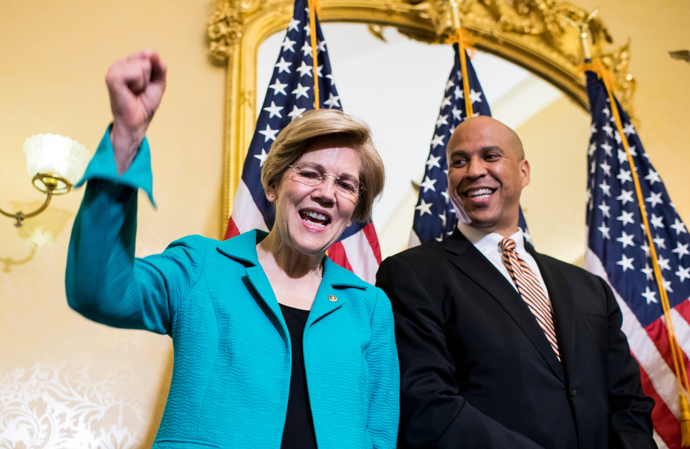 Sen. Cory Booker, D-N.J., and Sen. Elizabeth Warren, D-Mass., hold their news conference in the Capitol to introduce the "Dignity for Incarcerated Women Act" on Tuesday, July 11, 2017. (Photo By Bill Clark/CQ Roll Call)