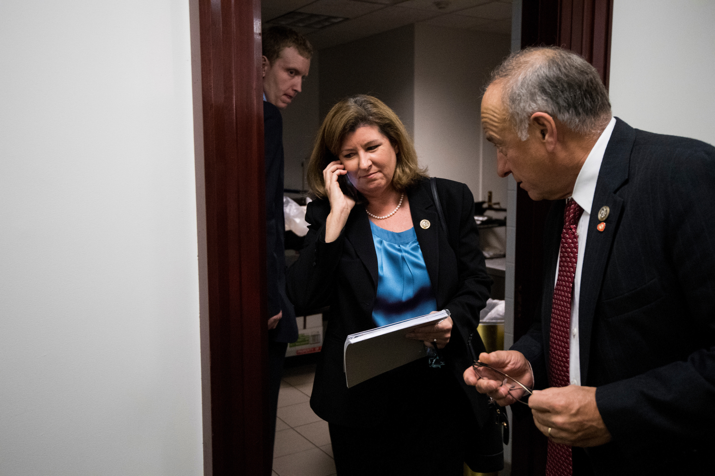 Rep. Karen Handel, R-Ga., and Rep. Steve King, R-Iowa, talk as they leave the House Republican Conference meeting in the Capitol on Tuesday, Nov. 14, 2017. (Bill Clark/CQ Roll Call file photo)