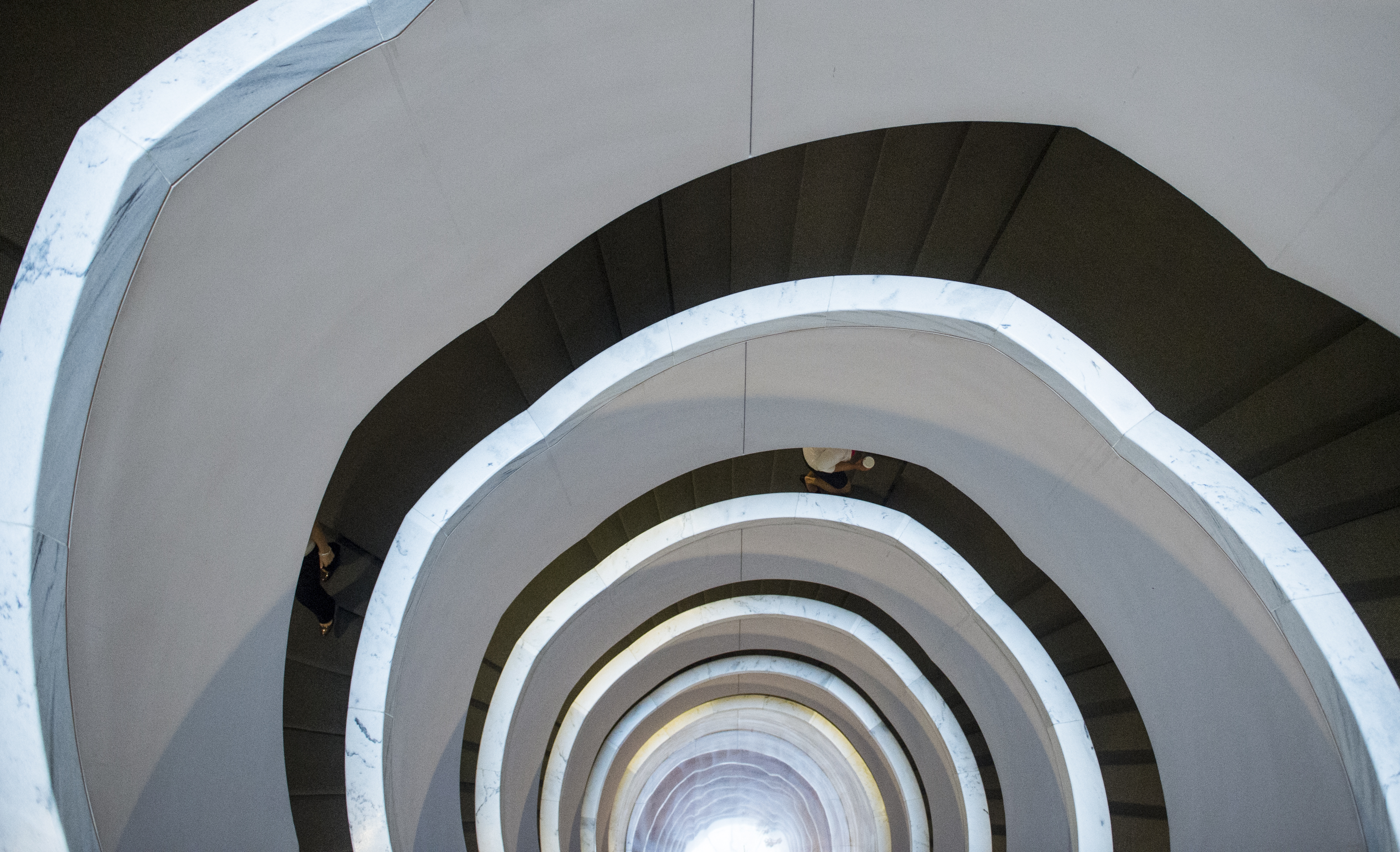 Your days on the Hill may be long, but the years will be short, former staffers warn. Above, staffers take the stairs in the Hart Senate Office Building in 2013. (Bill Clark/CQ Roll Call file photo)