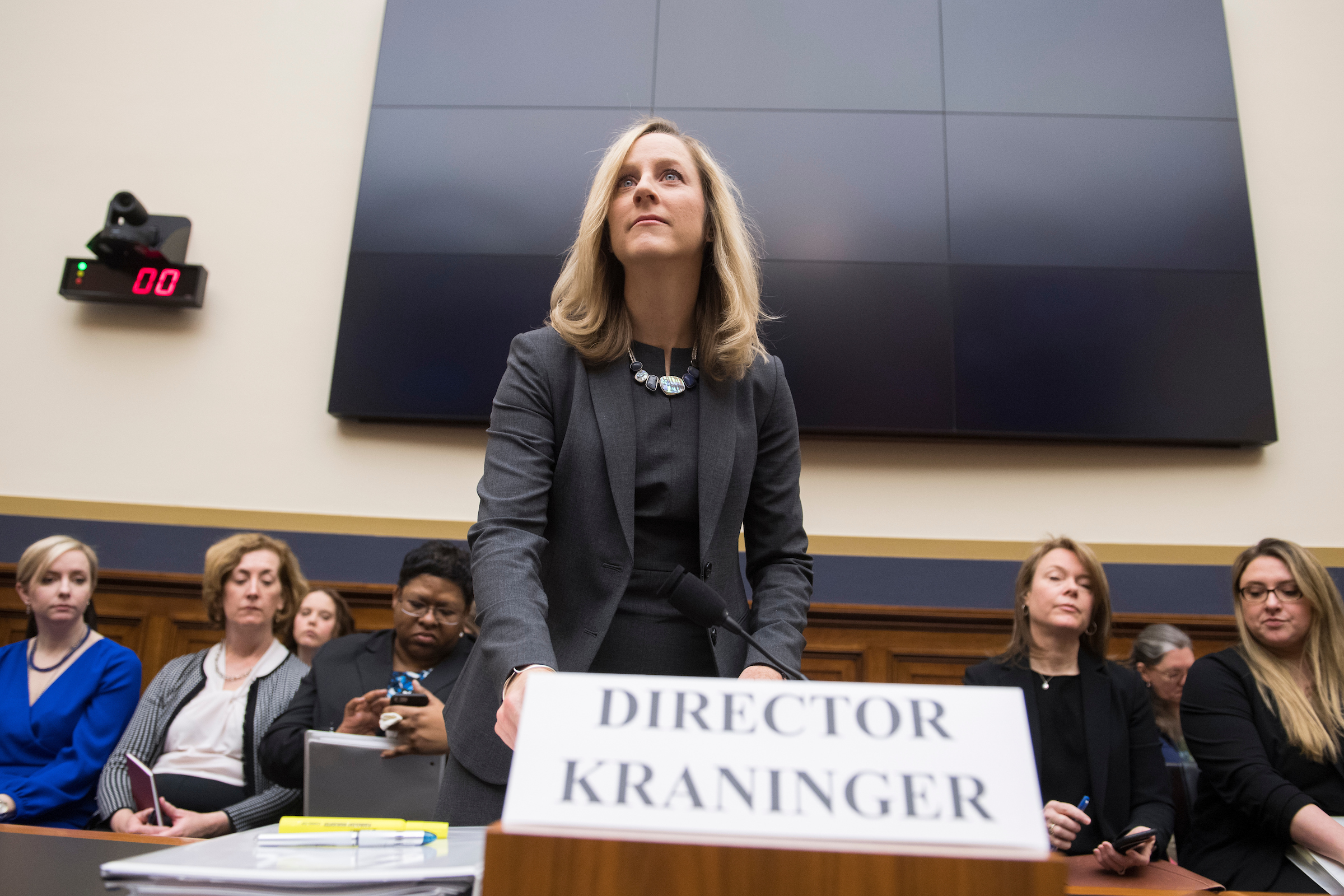 Kathy Kraninger, director of the Consumer Financial Protection Bureau, prepares to testify at a House Financial Services Committee hearing on March 7, 2019. (Tom Williams/CQ Roll Call file photo)