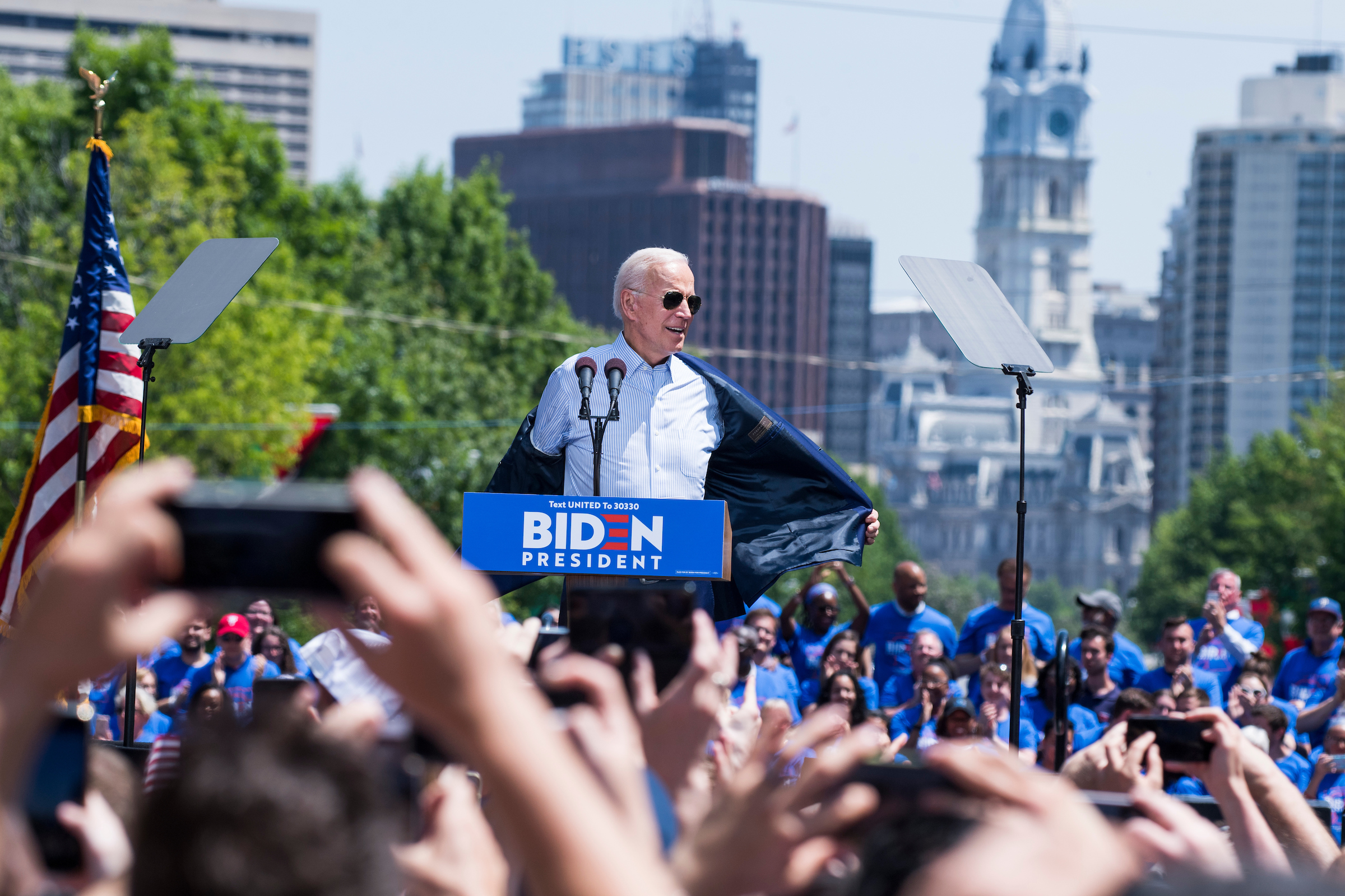 Former Vice President Joe Biden removes his jacket at the Eakins Oval in Philadelphia on Saturday as he formally kicks off his 2020 White House bid. (Tom Williams/CQ Roll Call)