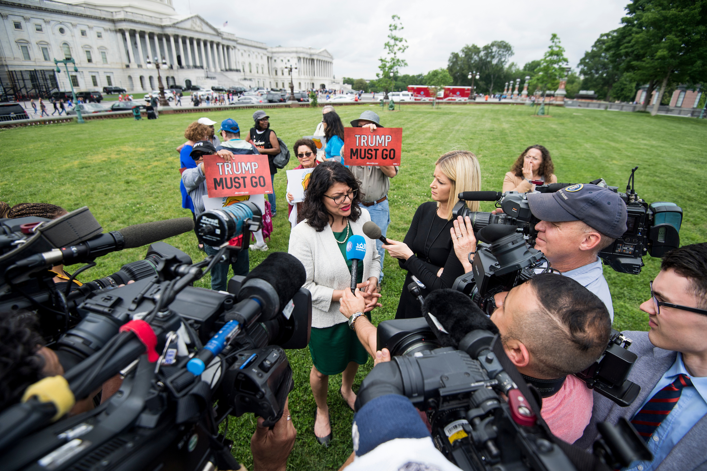 Rep. Rashida Tlaib, D-Mich., speaks to reporters after a coalition of advocacy groups delivered more than 10 million petition signatures to Congress earlier this month urging the House to start impeachment proceedings against President Donald Trump. (Bill Clark/CQ Roll Call)