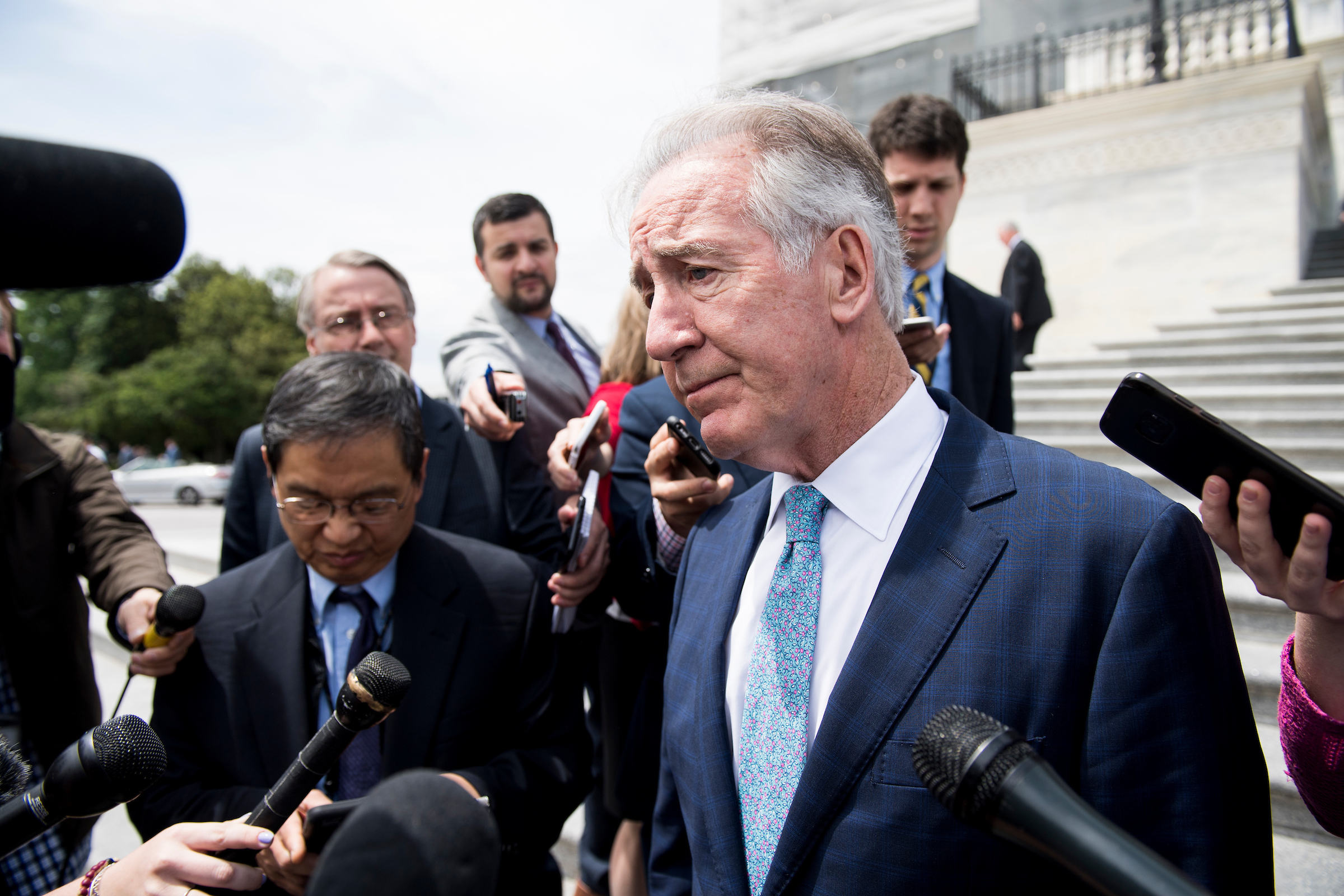 Ways and Means chairman Rep. Richard Neal, D-Mass., stops to speak to reporters as he walks down the House steps after the final votes of the week on Friday, May 17, 2019. Neal told reporters he believes the fight over Donald Trump’s tax returns is headed to court as early as next week. (Bill Clark/CQ Roll Call)