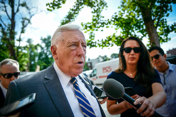  House Majority Leader Steny H. Hoyer, D-Md., talks with reporters before attending a meeting with other House Democrats to discuss potential border bill changes at the Democratic National Committee on Tuesday. (Caroline Brehman/CQ Roll Call)