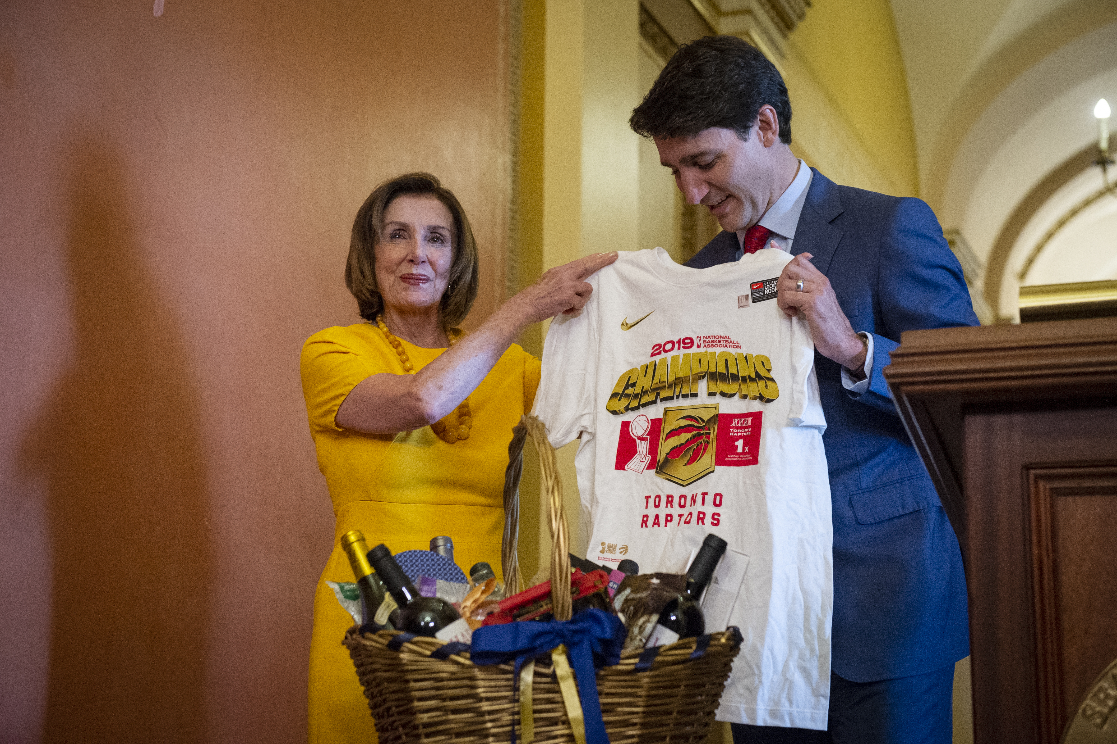 UNITED STATES - JUNE 20: Speaker of the House Nancy Pelosi, D-Calif., and Canadian Prime Minister Justin Trudeau exchange gifts as they settle a wager over the recent NBA basketball championship game between her Golden State Warriors and his victorious Toronto Raptors at the Capitol in Washington on Thursday June 20, 2019. (Photo by Caroline Brehman/CQ Roll Call)