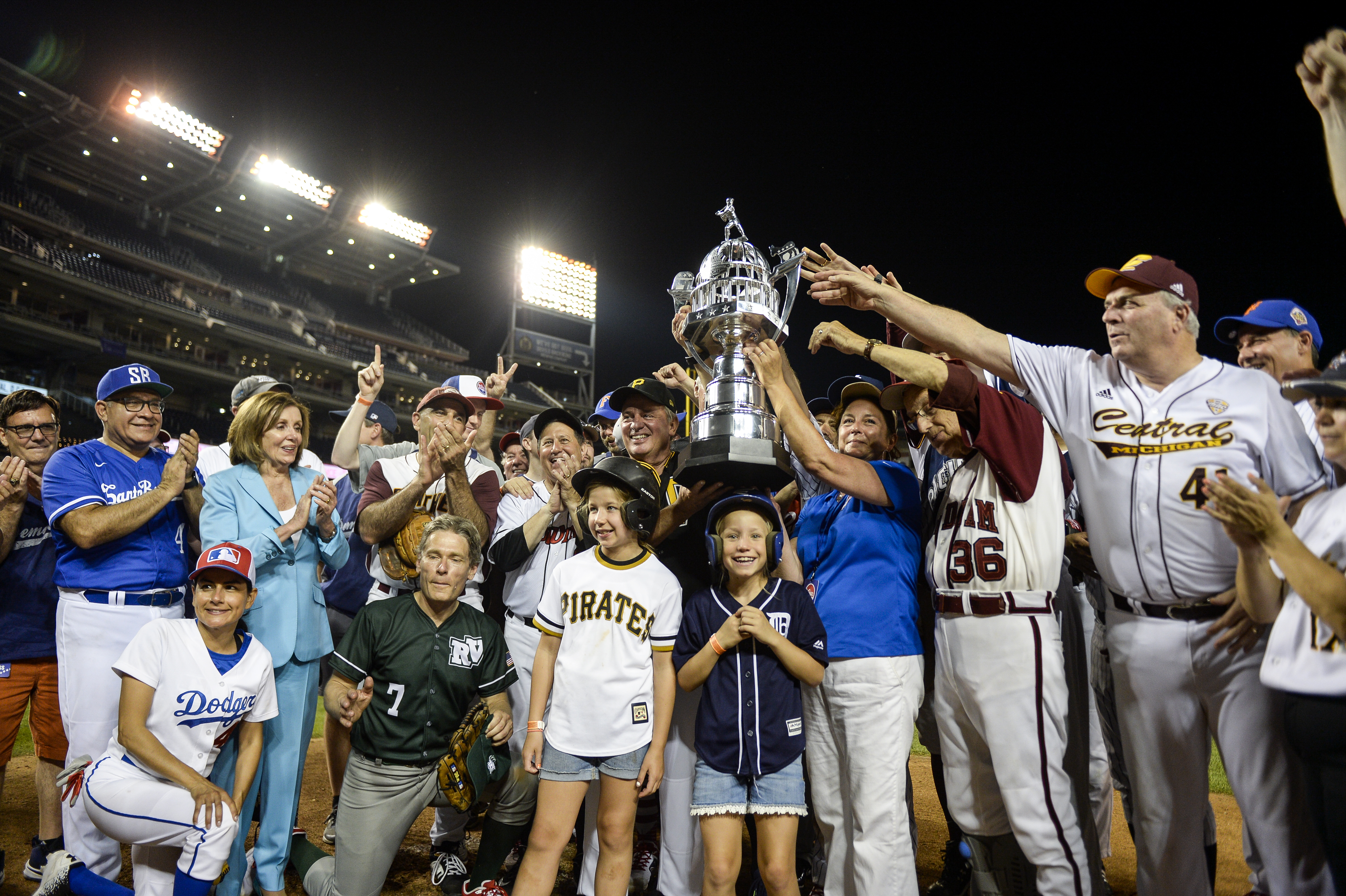UNITED STATES - JUNE 26: The Democrats stand with their trophy after their 14-7 win over the Republicans in the 58th annual Congressional Baseball Game at Nationals Park on Wednesday June 26, 2019. (Photo by Caroline Brehman/CQ Roll Call)