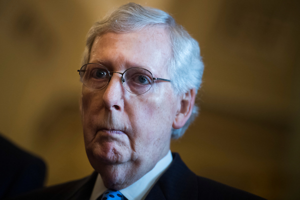 Senate Majority Leader Mitch McConnell does not want to delay votes on a defense policy bill so that Democratic senators can head to a series of presidential debates in Miami. (Tom Williams/CQ Roll Call)