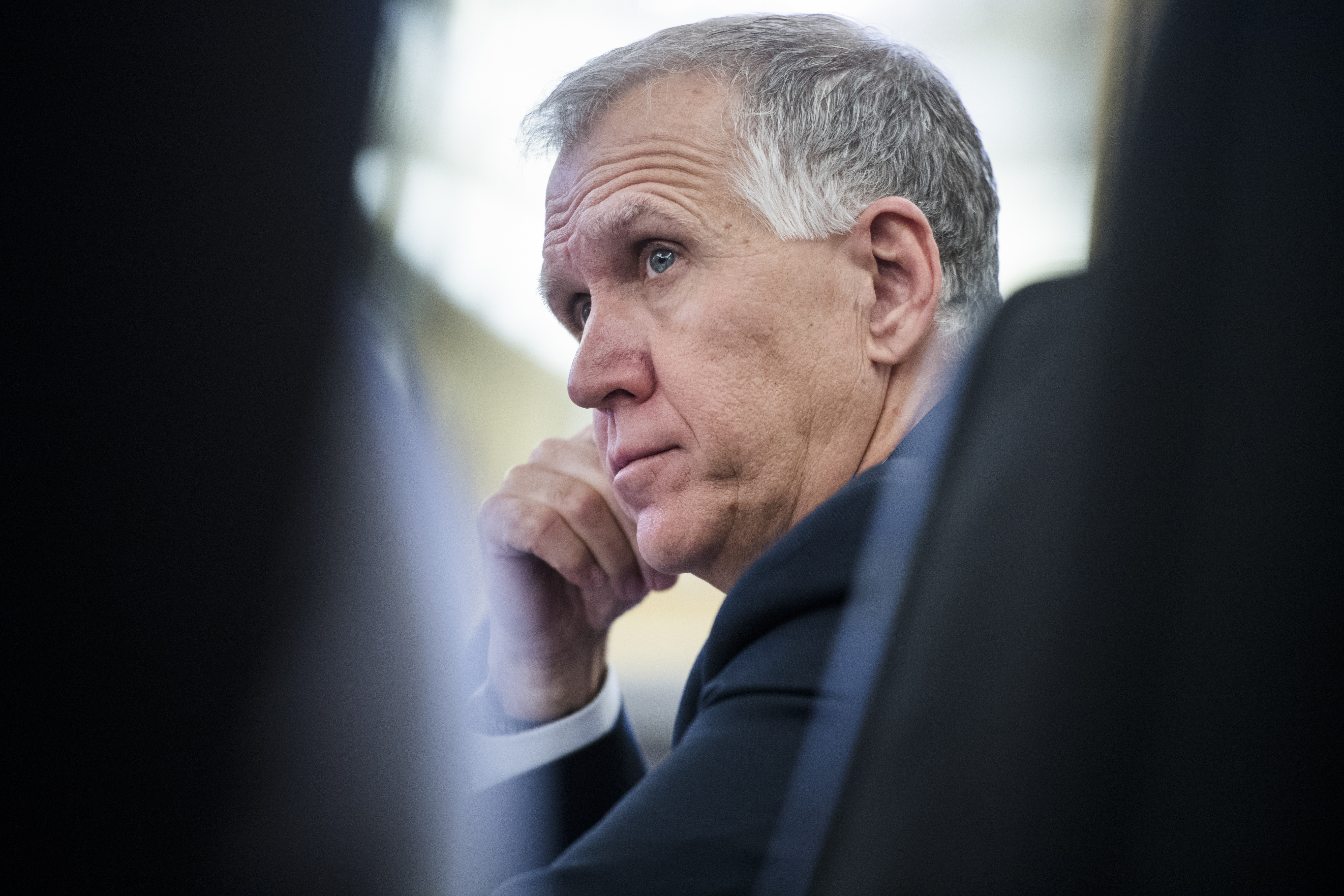 Thom Tillis’ Senate re-election campaign captures the state of play in North Carolina, Curtis writes. The Republican is sticking with the president, while his office churns out releases showing a more bipartisan side. (Tom Williams/CQ Roll Call file photo)